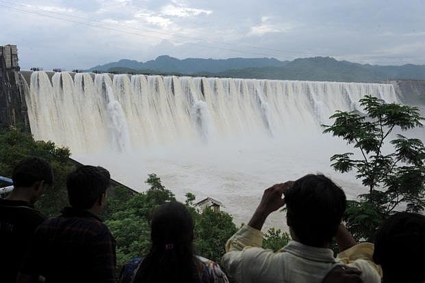 Does Narmada river vary her flow as per Gujarat’s election cycle?