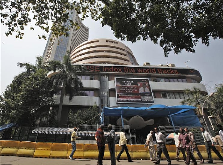 Weak global cues subdue equity indices, Sensex closes below 35k