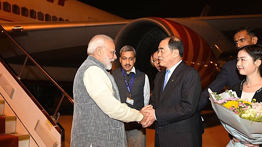 PM Modi, President Xi meet under shadows in Wuhan, China