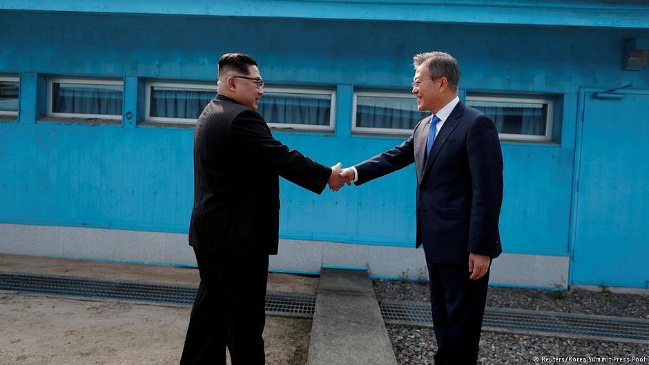 The historic occasion when  North Korean leader Kim Jong Un (left) shook hands with South Korean President Moon Jae In at the line that divides the two Koreas at  Panmunjom on April 27, 2018