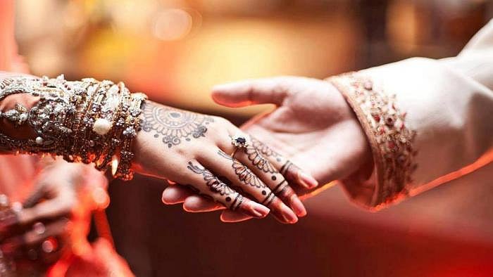 In message of Hindu-Muslim amity, family prints special wedding cards 