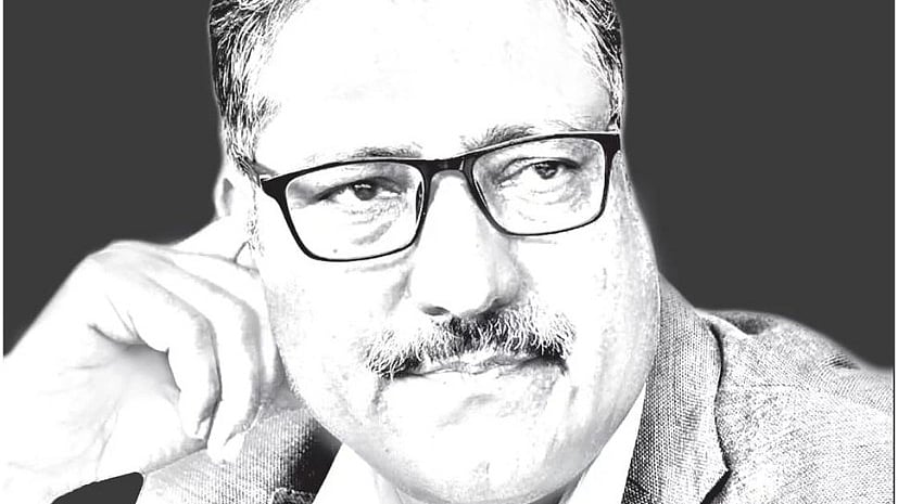 Slain editor-in-chief of Rising Kashmir, Shujaat Bukhari (file photo)