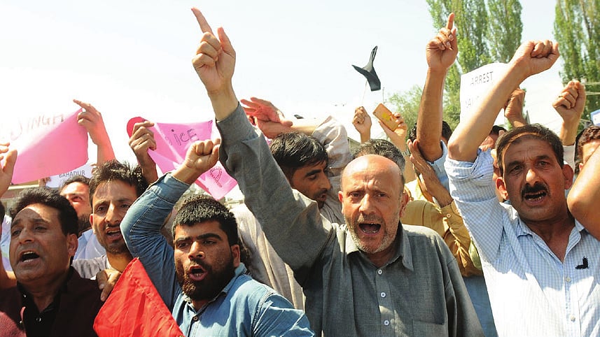 Independent MLA Sheikh Abdul Rashid along with his supporters shouts slogansagainst (BJP) leader Choudhary Lal Singh in Srinagar