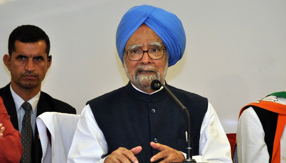Manmohan tells Modi he must honour commitments made to Andhra Pradesh