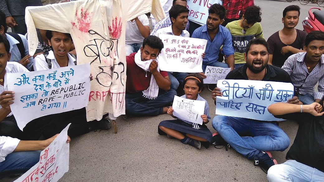 Agitators protest the horrific acts of sexual abuse of children in Muzaffarpur
