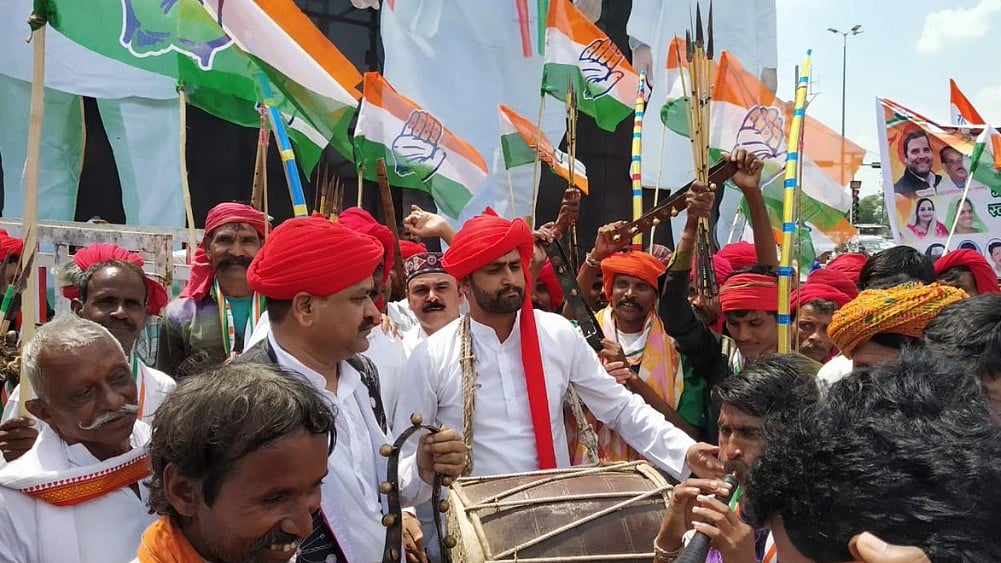 Congress workers in Bhopal, Madhya Pradesh on September 17 during Congress President Rahul Gandhi’s road show to launch the party’s campaign for the upcoming assembly elections