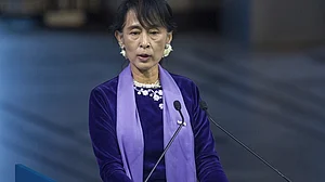 Suu Kyi defends court decision to jail Reuters reporters