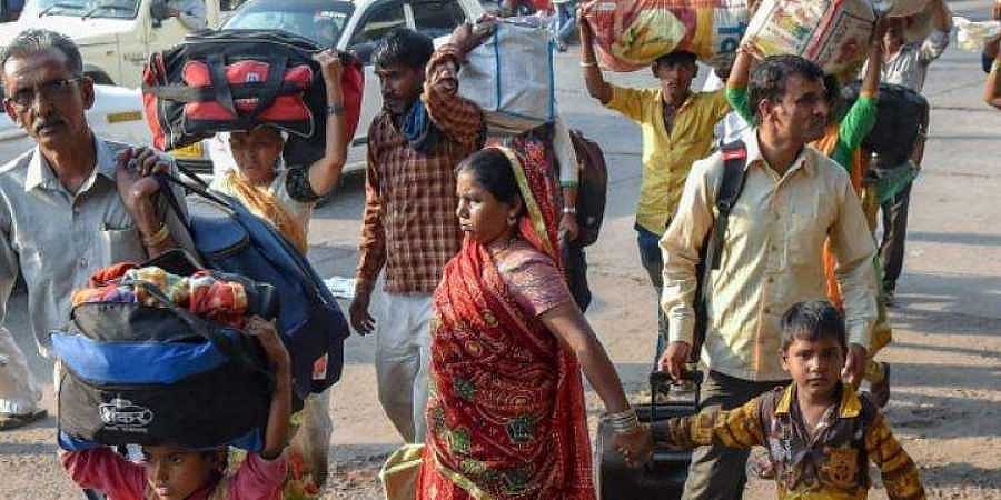 Gujarat  migrant exodus: Industries press panic button