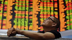 Asian markets slip as tech stocks drag, oil tumbles on Iran signals