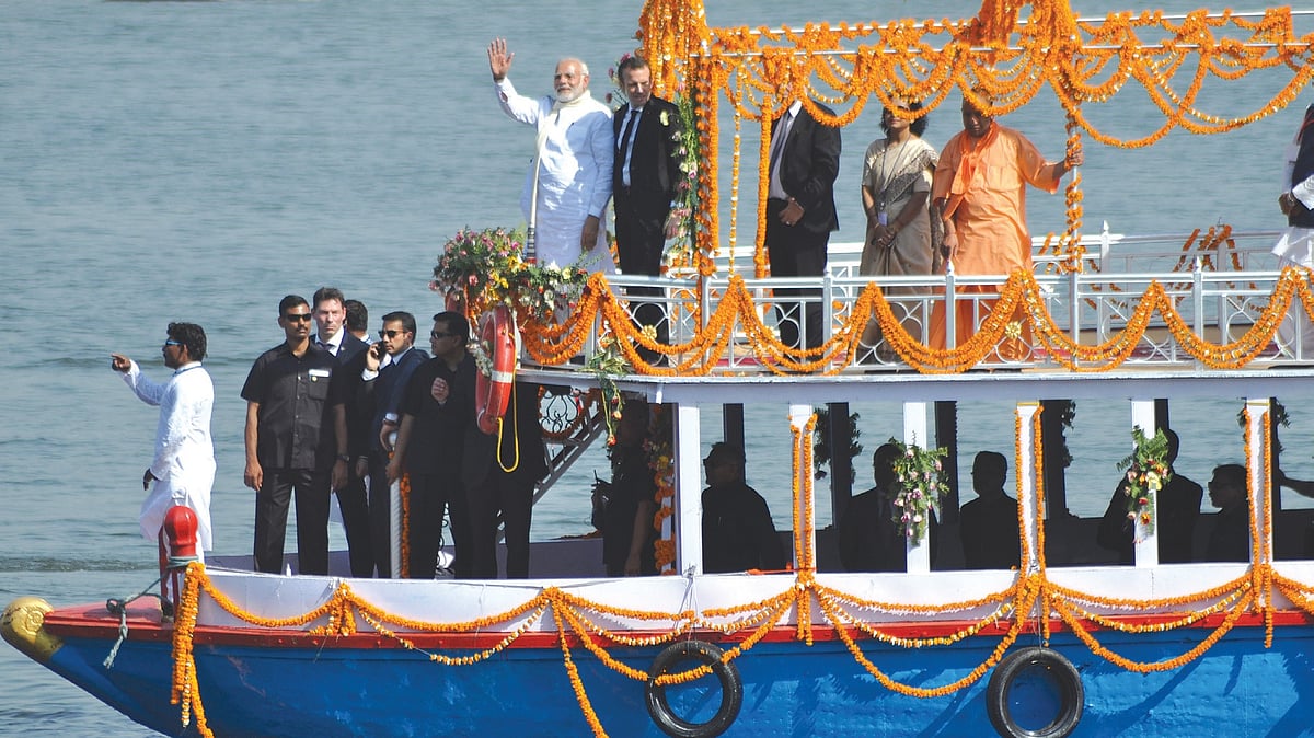 PM Modi, accompanied by French President Emmanuel Macron, on a river cruise on the Ganga in Varanasi earlier this year