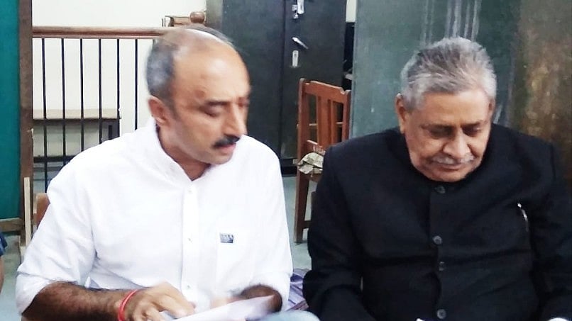 Former IPS officer Sanjiv Bhatt (left) with his lawyer