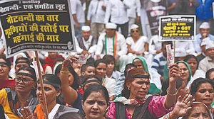 Cashless economy brought about by demonetisation hurt the poor and the economy