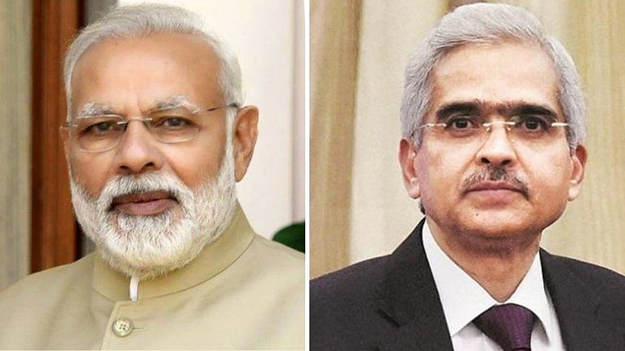 Prime Minister Narendra Modi (L) and RBI Governor Shaktikanta Das