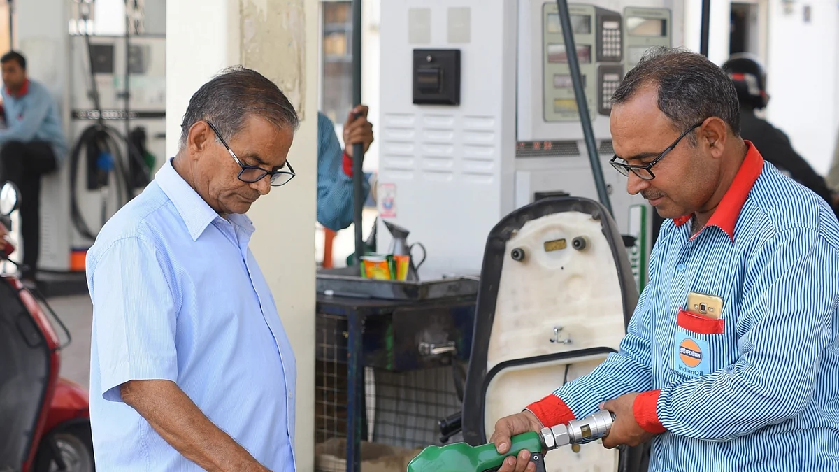 A man gets the petrol tank of his two-wheeler filled in Bikaner (A file picture) <i>IANS</i>&nbsp;