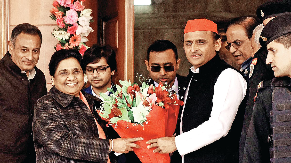 Samajwadi Party chief Akhilesh Yadav greets Bahujan Samaj Party supremo Mayawati on her 63rd birthday at her residence on January 15, 2019 in Lucknow