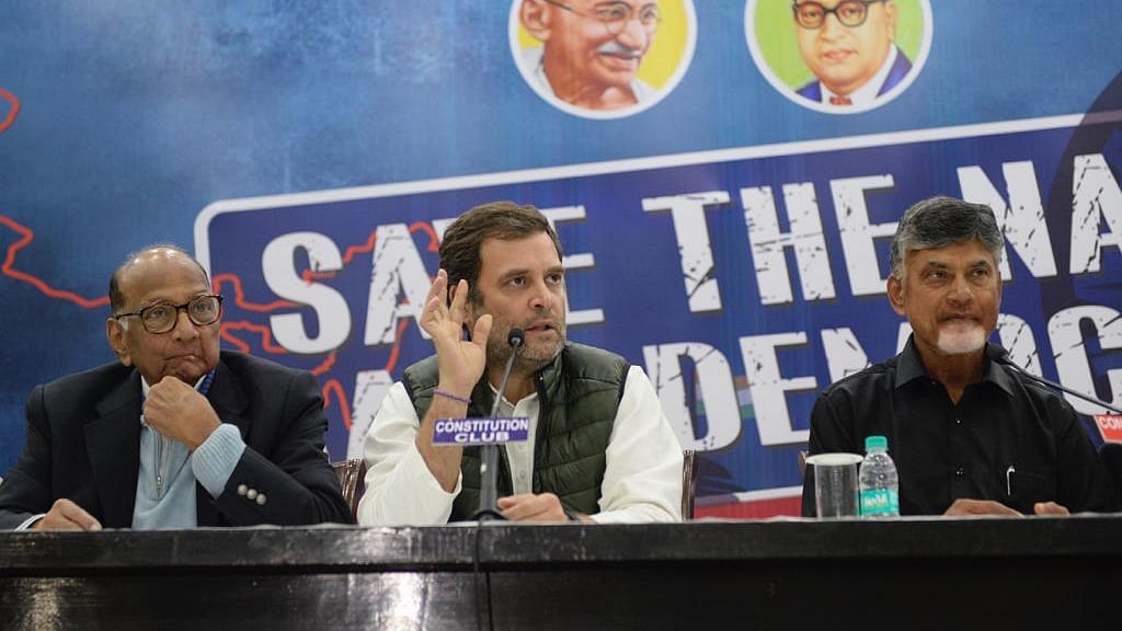 Congress President Rahul Gandhi addressing the media at New Delhi’s Constitution Club on Friday. He is flanked by NCP chief Sharad Pawar (left) and Andhra Pradesh CM N Chandrababu Naidu