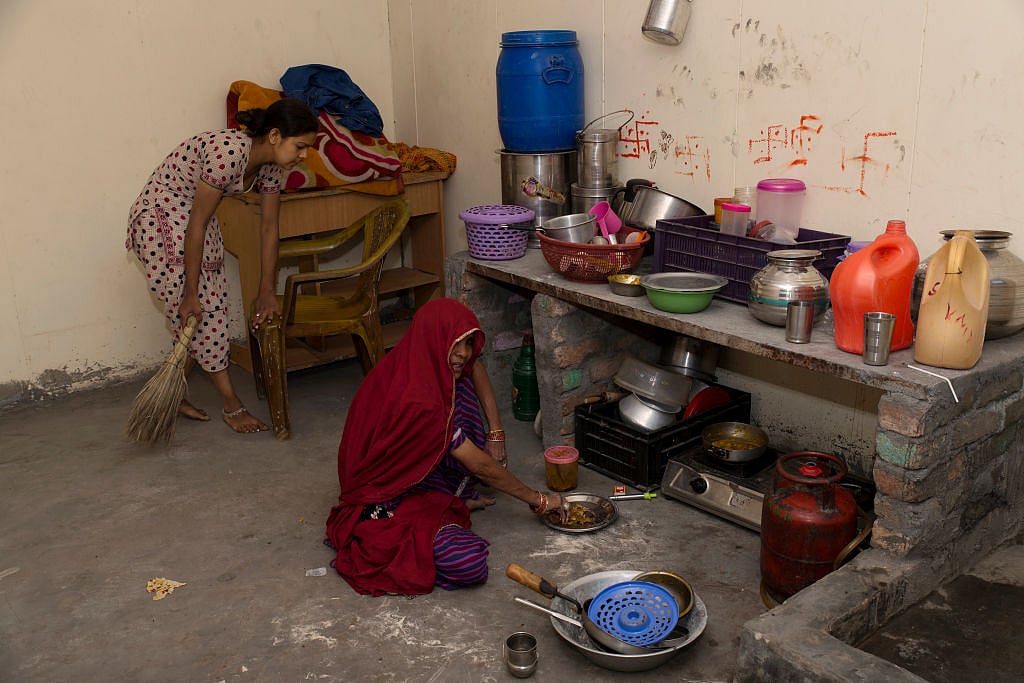 Women still associated with household work in India, states survey