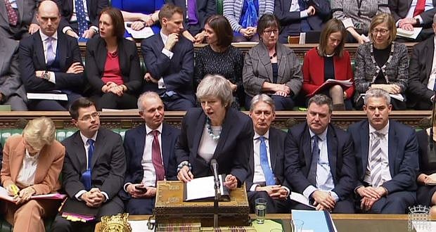 British MPs vote to change Brexit date