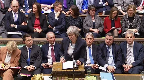 British MPs vote to change Brexit date