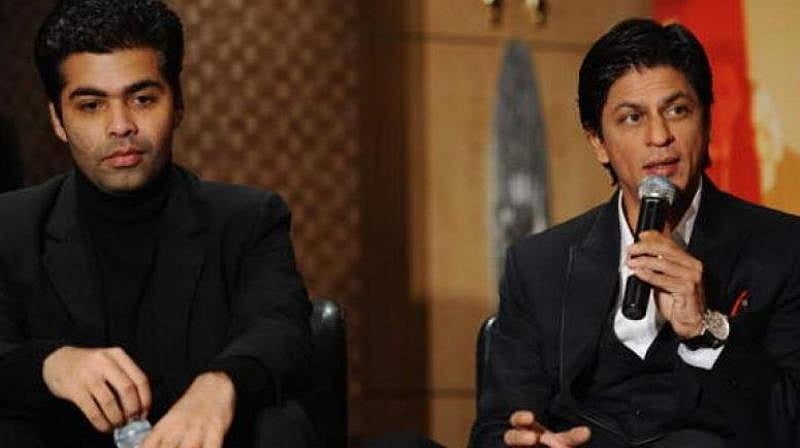 Karan Johar roasted over liking anti-SRK tweet, says Twitter handle having ‘technical problem’