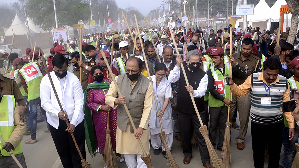 Uttar Pradesh Health Minister Siddharth Nath Singh with others sweep a street in an attempt to create a record under Clean Kumbh Mela 2019 Swachata program at the bank of river Ganga during the ongoing Kumbh Mela-2019, in Prayagraj (Allahabad), Saturday, March 2, 2019