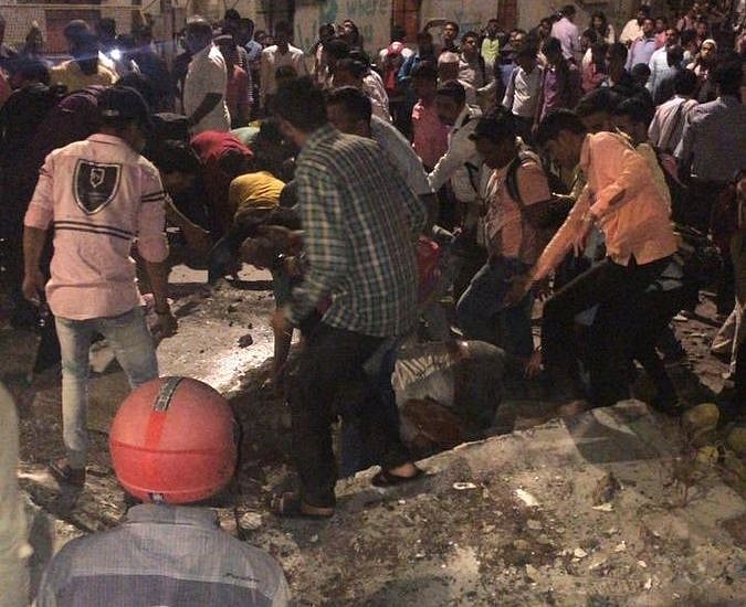 At least four dead, 32 injured as foot overbridge collapses near Mumbai CST