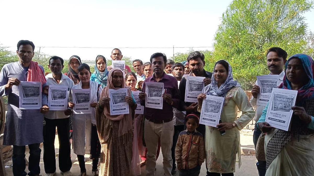 Villagers holding the Chambal Manifesto (Twitter)