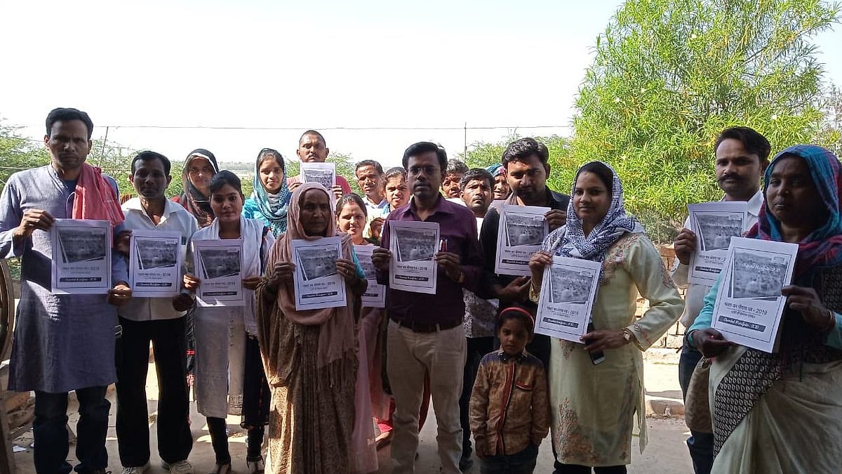 Villagers holding the Chambal Manifesto (Twitter)