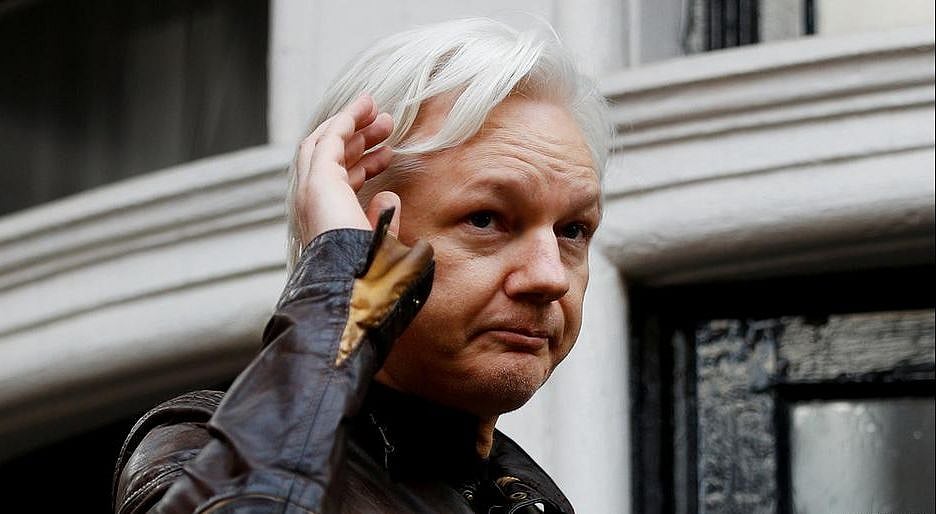 Assange held, charged with conspiracy in US 
