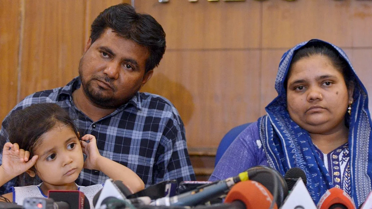 Gujarat gang-rape survivor Bilkis Yakub Rasool Bano with her husband and daughter, during a press conference in New Delhi. Bano was gang-raped at the age of twenty-one in the post-Godhra riots in 2002.&nbsp;