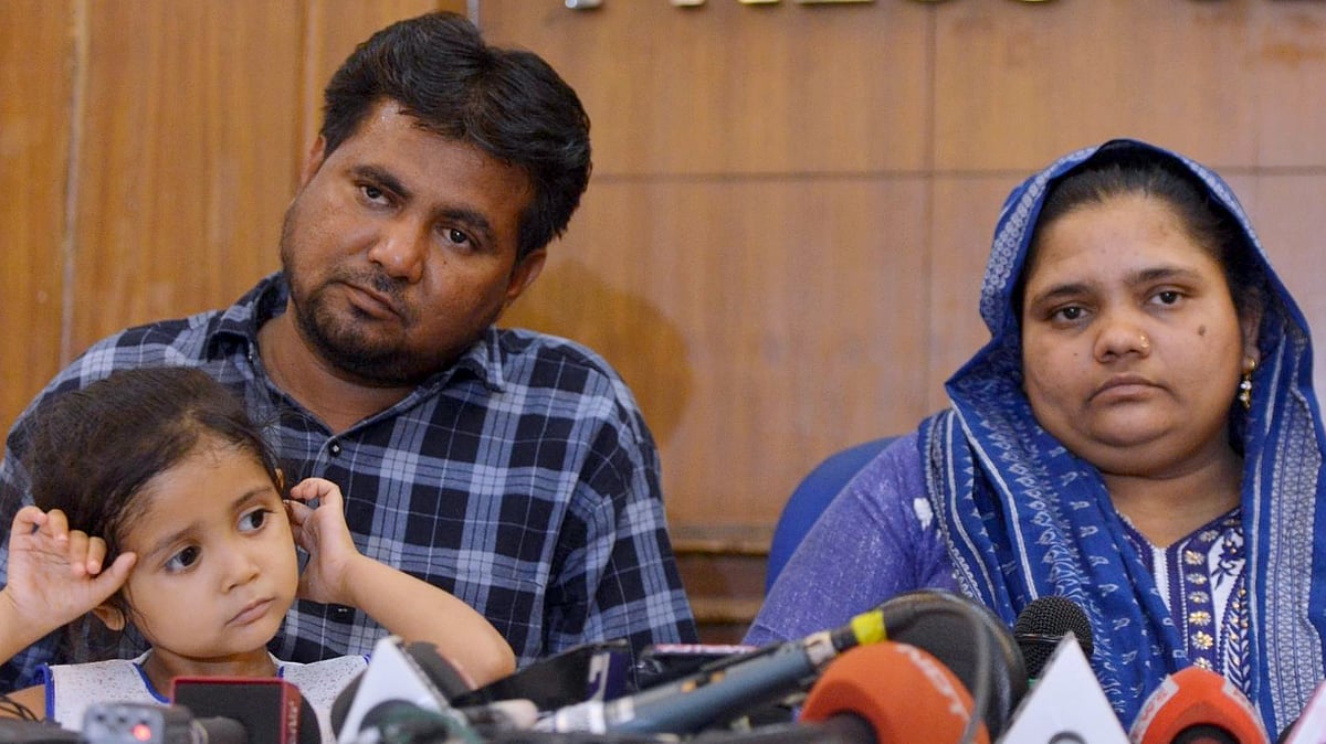 Gujarat gang-rape survivor Bilkis Yakub Rasool Bano with her husband and daughter, during a press conference in New Delhi. Bano was gang-raped at the age of twenty-one in the post-Godhra riots in 2002.&nbsp;