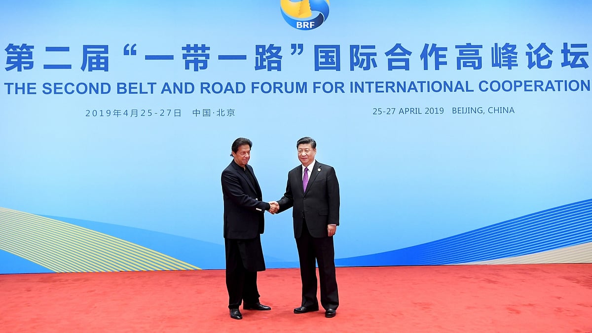 Chinese President Xi Jinping shakes hands with Pakistani Prime Minister Imran Khan (IANS)