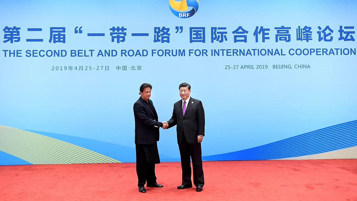 Chinese President Xi Jinping shakes hands with Pakistani Prime Minister Imran Khan (IANS)