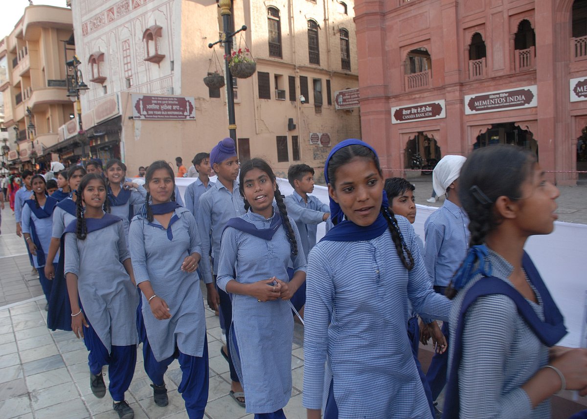 School children walking to take part in the candle march (Photo by Pramod Pushkarna)