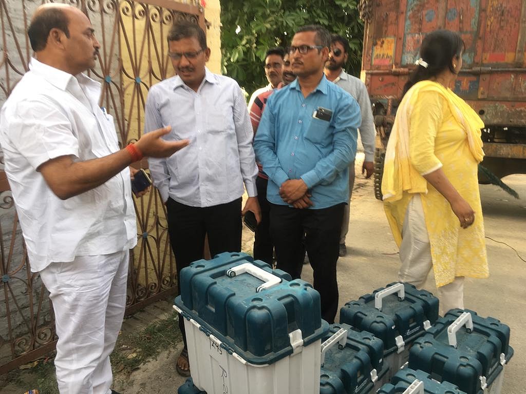 Officials were unable to explain why the EVMs were being moved out from the strong room/NH photo