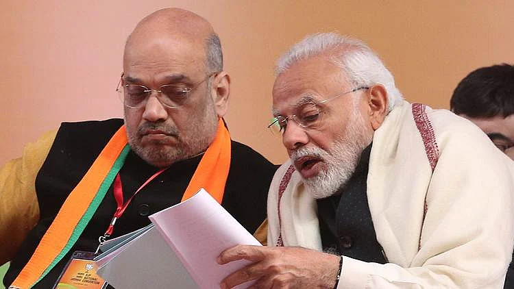 Prime Minister Narendra Modi with BJP president Amit Shah. (Express photo by Amit Mehra/File)