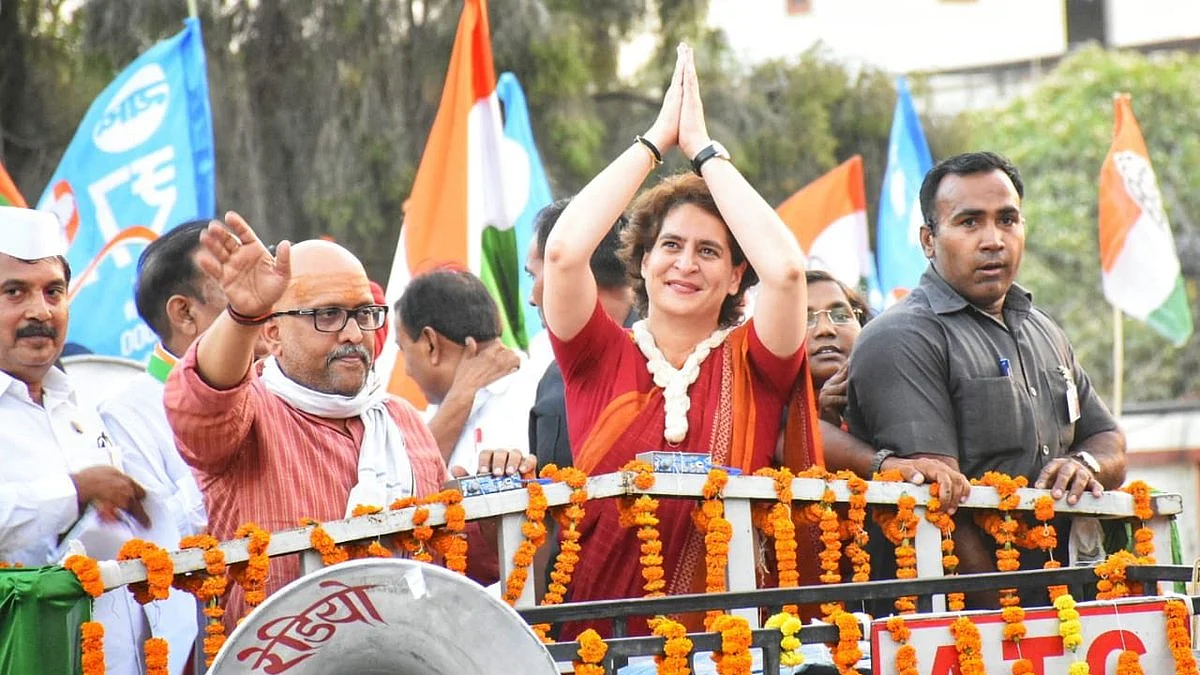 Congress general secretary (eastern UP) Priyanka Gandhi Vadra and party’s candidate from Varanasi Ajay Rai (second from left) during a roadshow in Varanasi on Wednesday