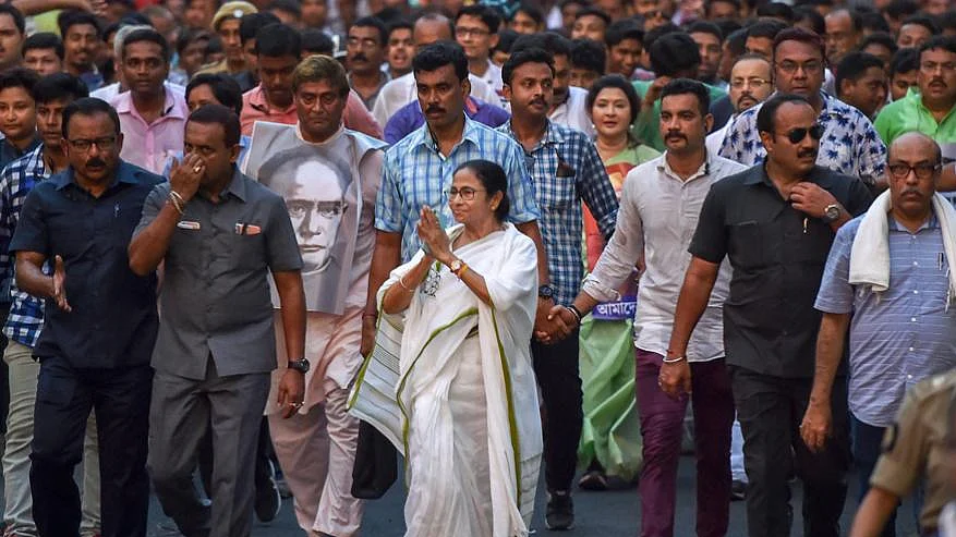  West Bengal Chief Minister and Trinamool Congress chief Mamata Banerjee in a protest rally against the clashes that broke out during BJP President Amit Shah’s election roadshow for Lok Sabha polls, in Kolkata on May 15, 2019. (Image: PTI) &nbsp;