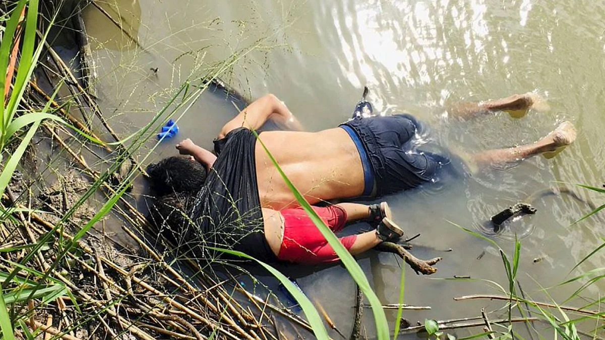 The bodies of Salvadorian migrant Oscar Alberto Martinez Ramirez and his daughter Valeria are seen after they drowned in the Rio Bravo river while trying to reach the United States (Social Media/Twitter)