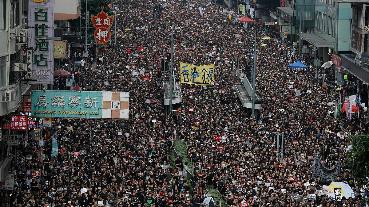 Lakhs of protesters march through the streets of Hong Kong  as they continue to protest an extradition bill, on June 16, 2019.