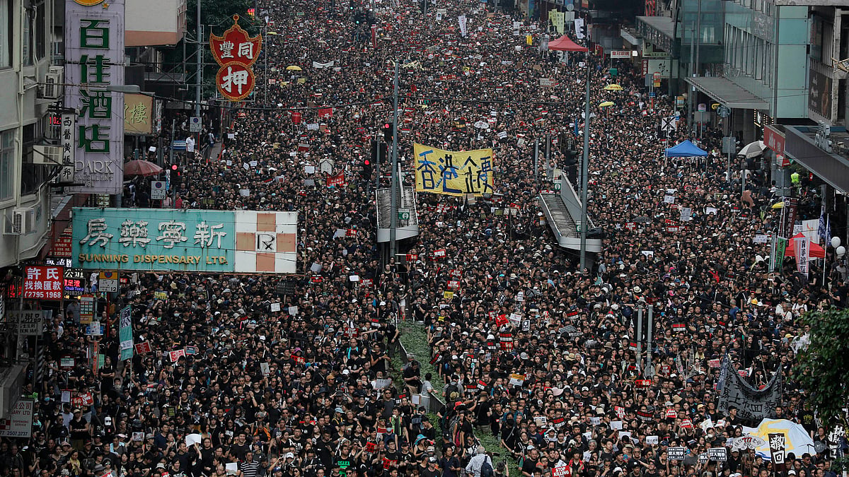 Lakhs of protesters march through the streets of Hong Kong  as they continue to protest an extradition bill, on June 16, 2019.