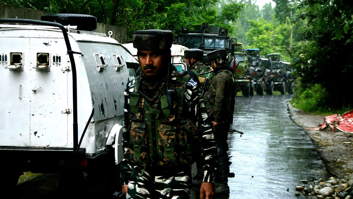 Security personnel deployed at the site where a gunfight broke out between militants and security forces in Jammu and Kashmir’s Shopian district, on June 23, 2019.&nbsp;