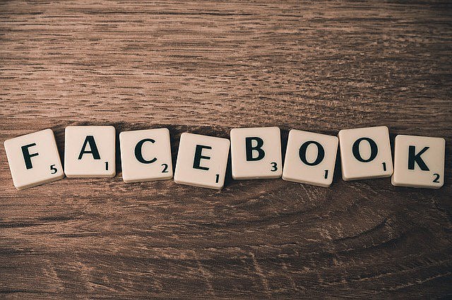 Protesters strip outside Facebook office against nudity censorship  