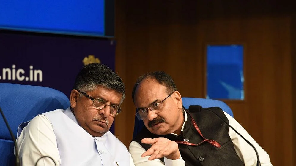 Union Law and Justice Minister Ravi Shankar Prasad (L) with Chief Executive Officer (CEO) of Unique Identification Authority of India (UIDAI) Ajay Bhushan Pandey. A file picture