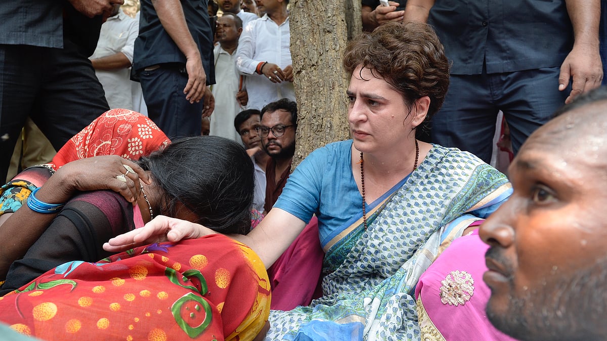 Priyanka Gandhi consoling the family members of the victims of Sonbhadra Firing incident