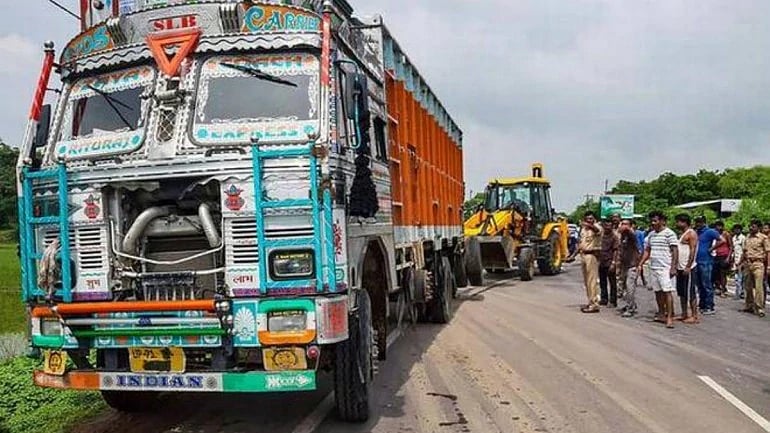 The truck’s number plate had been blackened with grease.