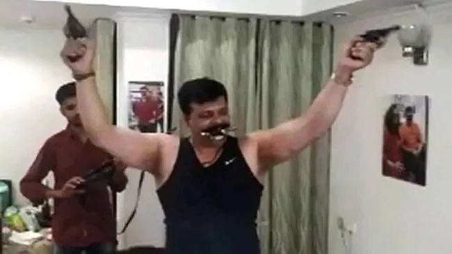 WATCH| BJP MLA dances to Karan Arjun songs with guns in hand
