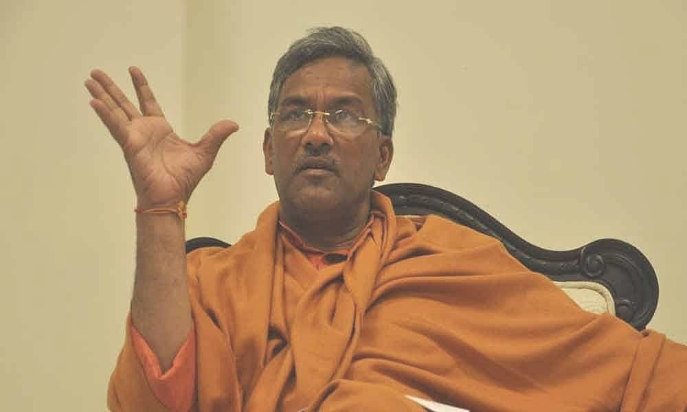 Coronavirus a living organism, has a right to live, says Trivendra Singh Rawat; gets trolled on social media