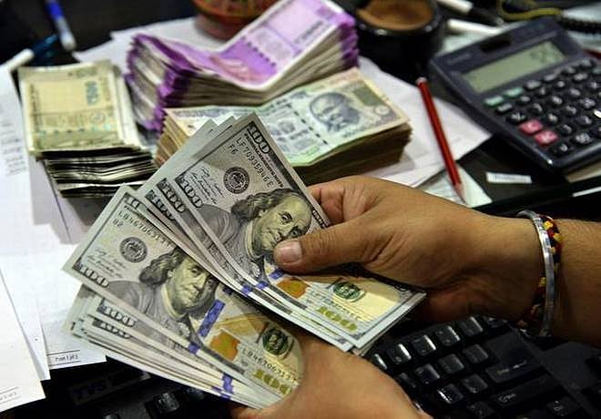 Rupee slips 29 paise against US dollar to 71.77