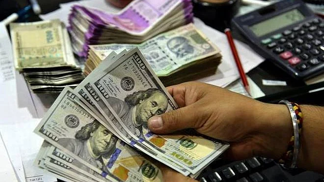 Rupee slips 29 paise against US dollar to 71.77